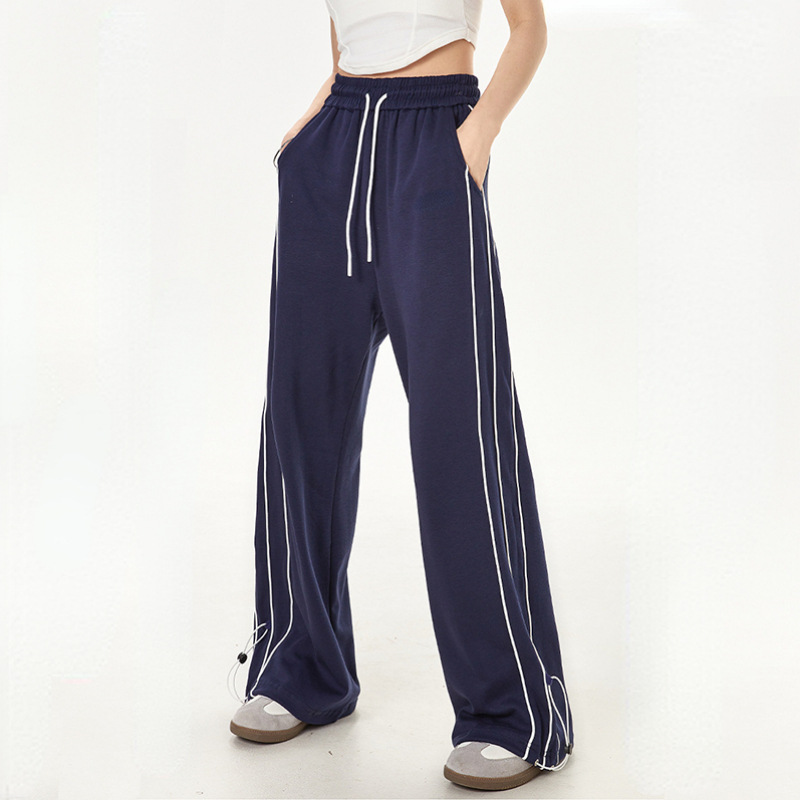 Pantaloni sportivi larghi con vita alta e gambe dritte