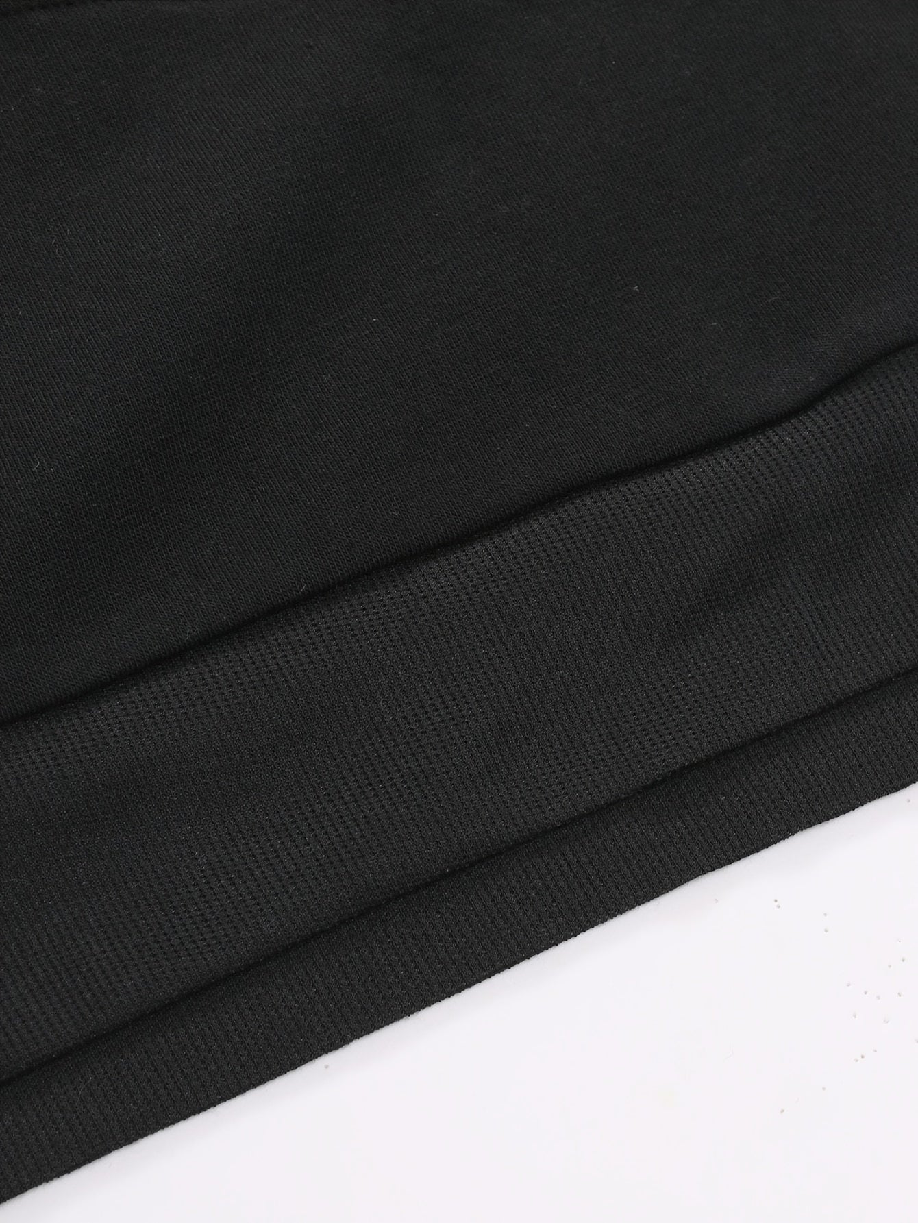 Maglione nero a righe