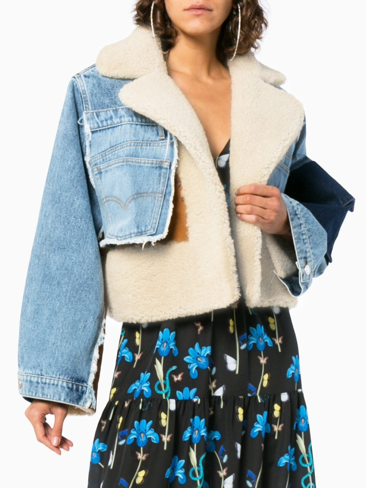 Giubbotto in peluche con cuciture in denim