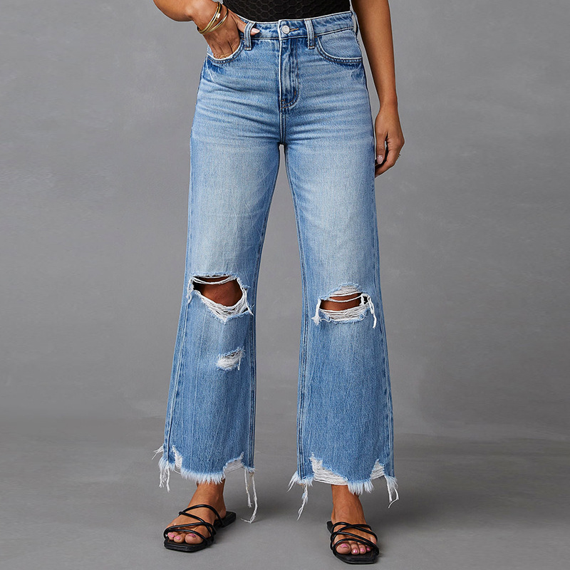 Jeans a vita alta con fori da donna