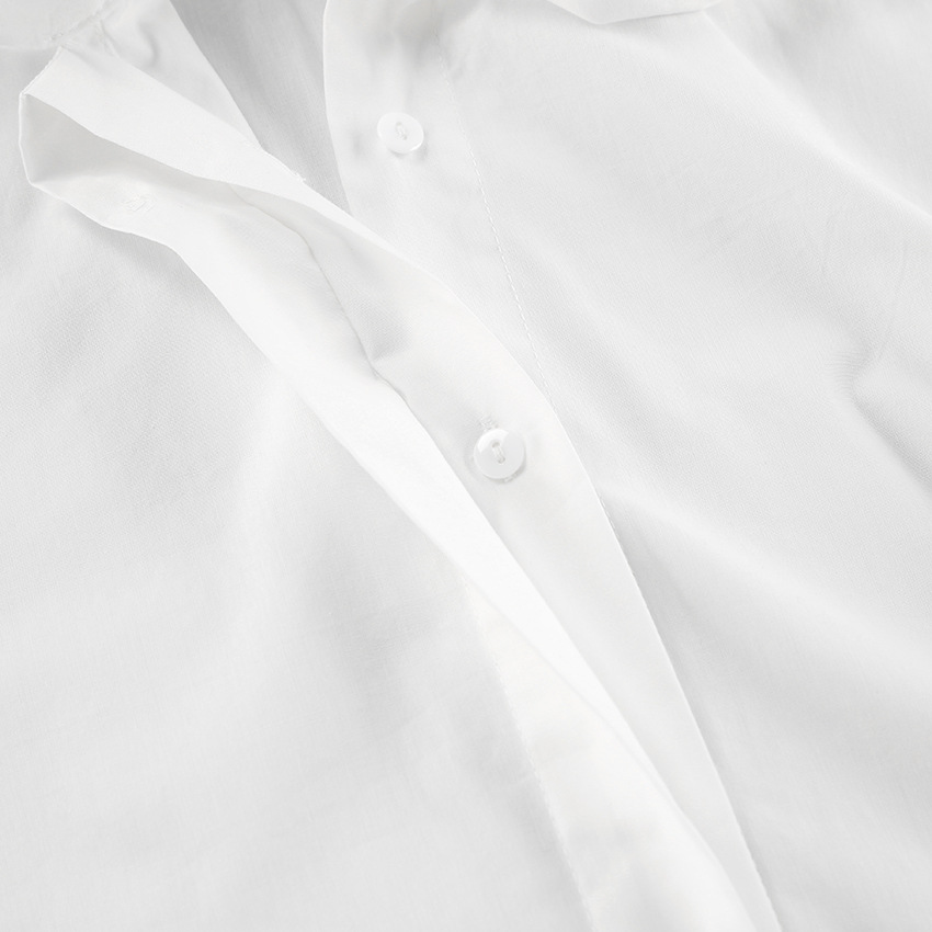 Camicia bianca con fiocco