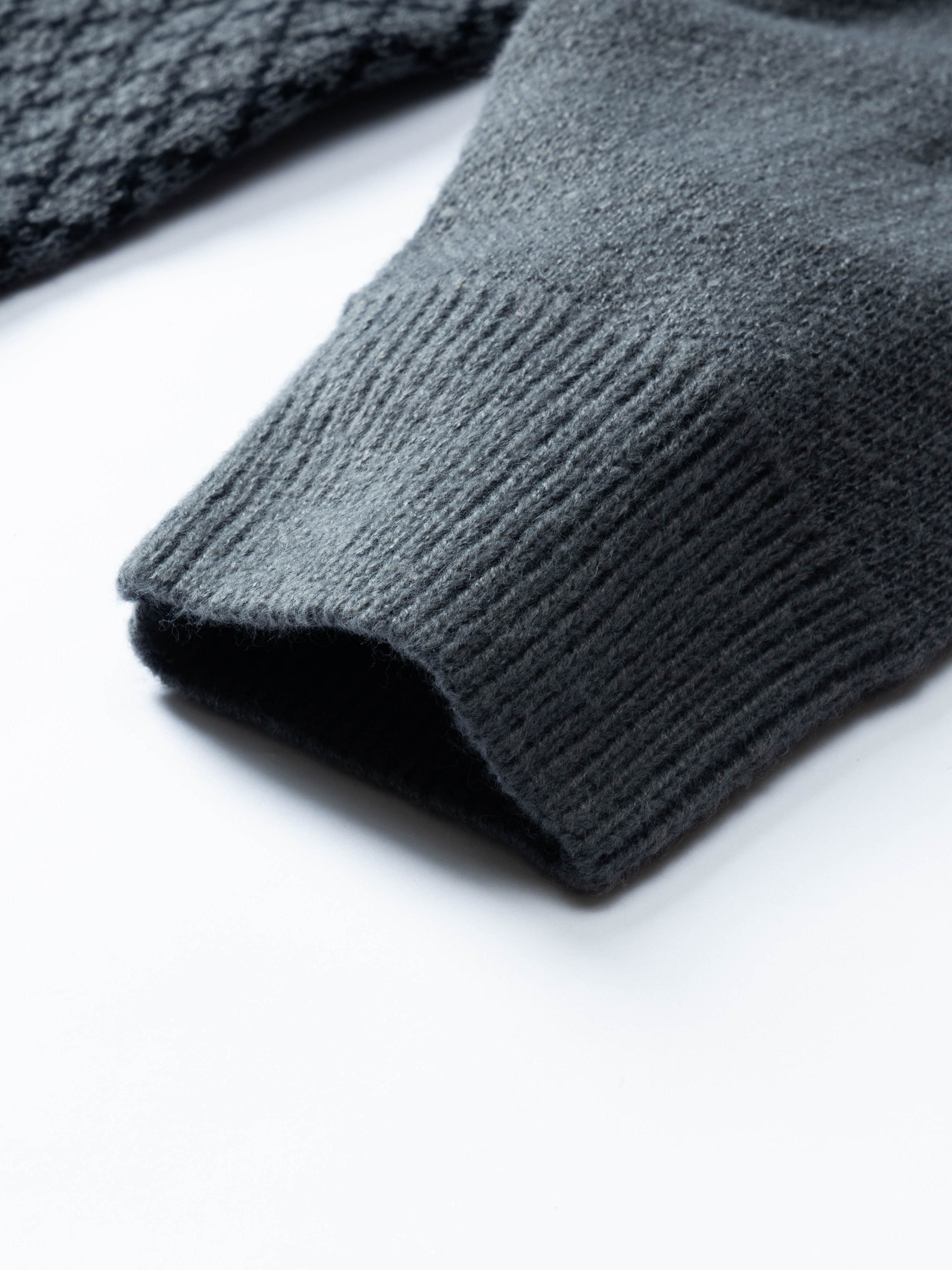 Maglione lavorato a maglia con motivo a rombi