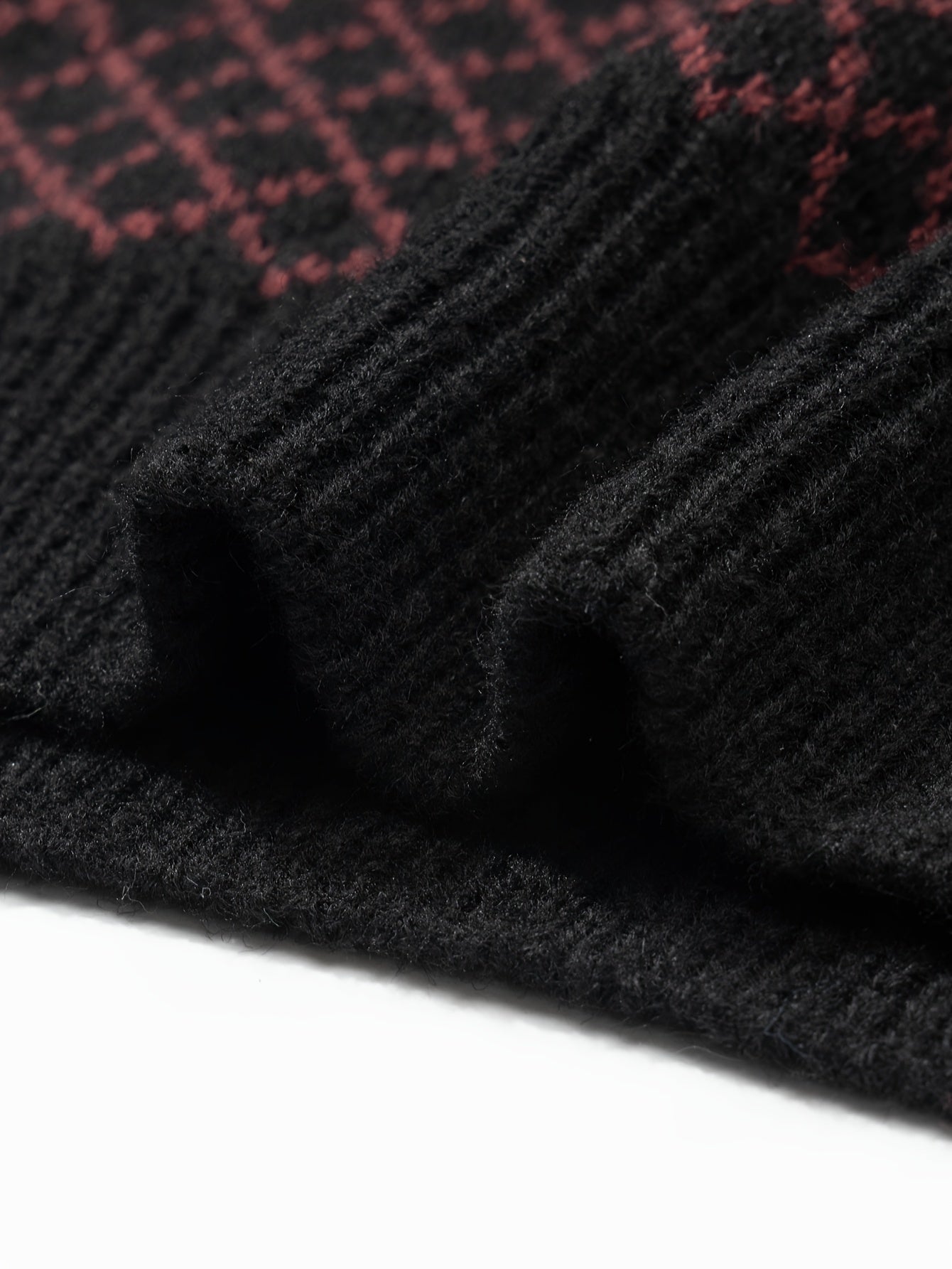 Maglione lavorato a maglia con motivo a rombi