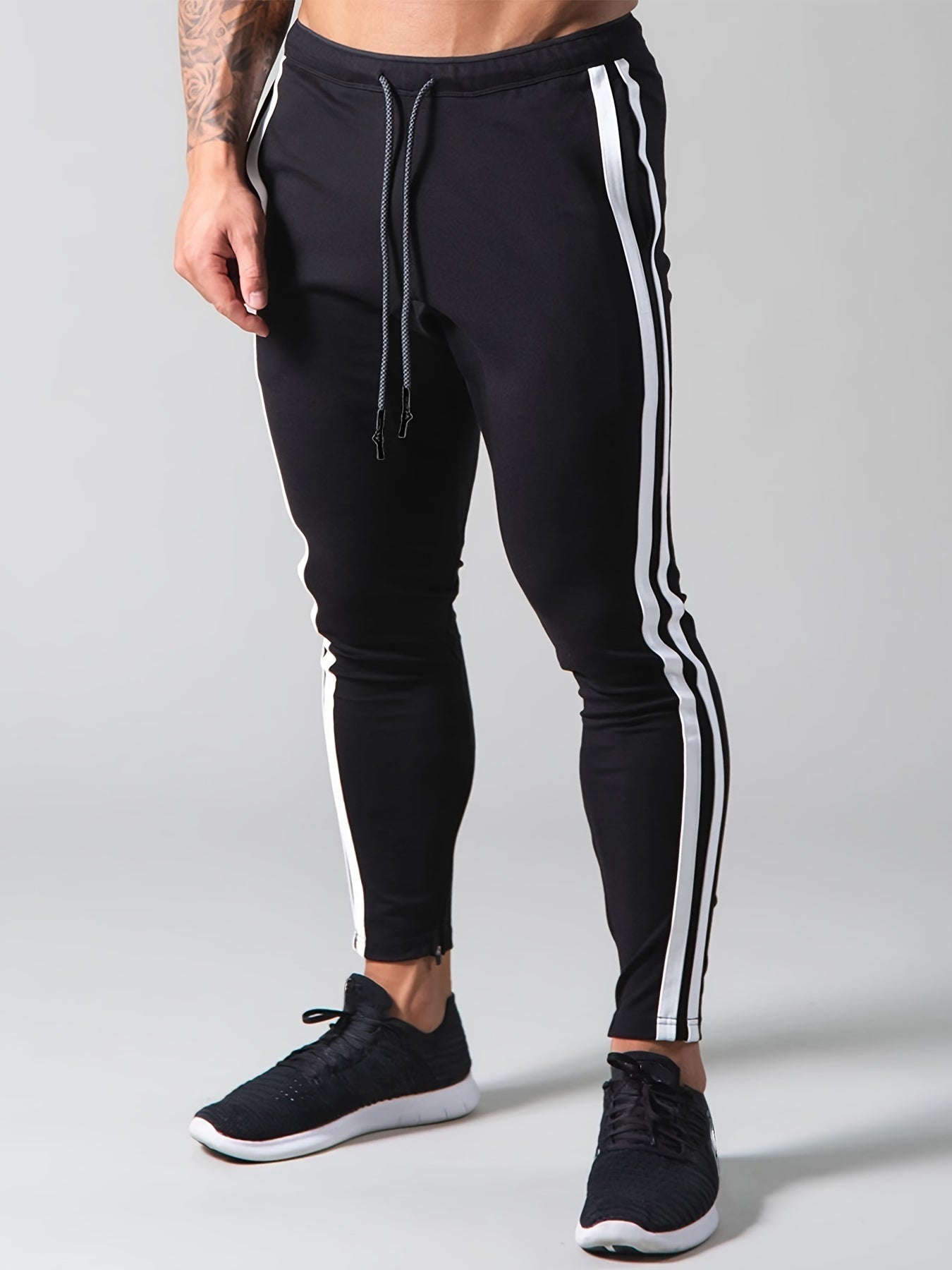 Pantaloni sportivi della tuta con motivo a righe