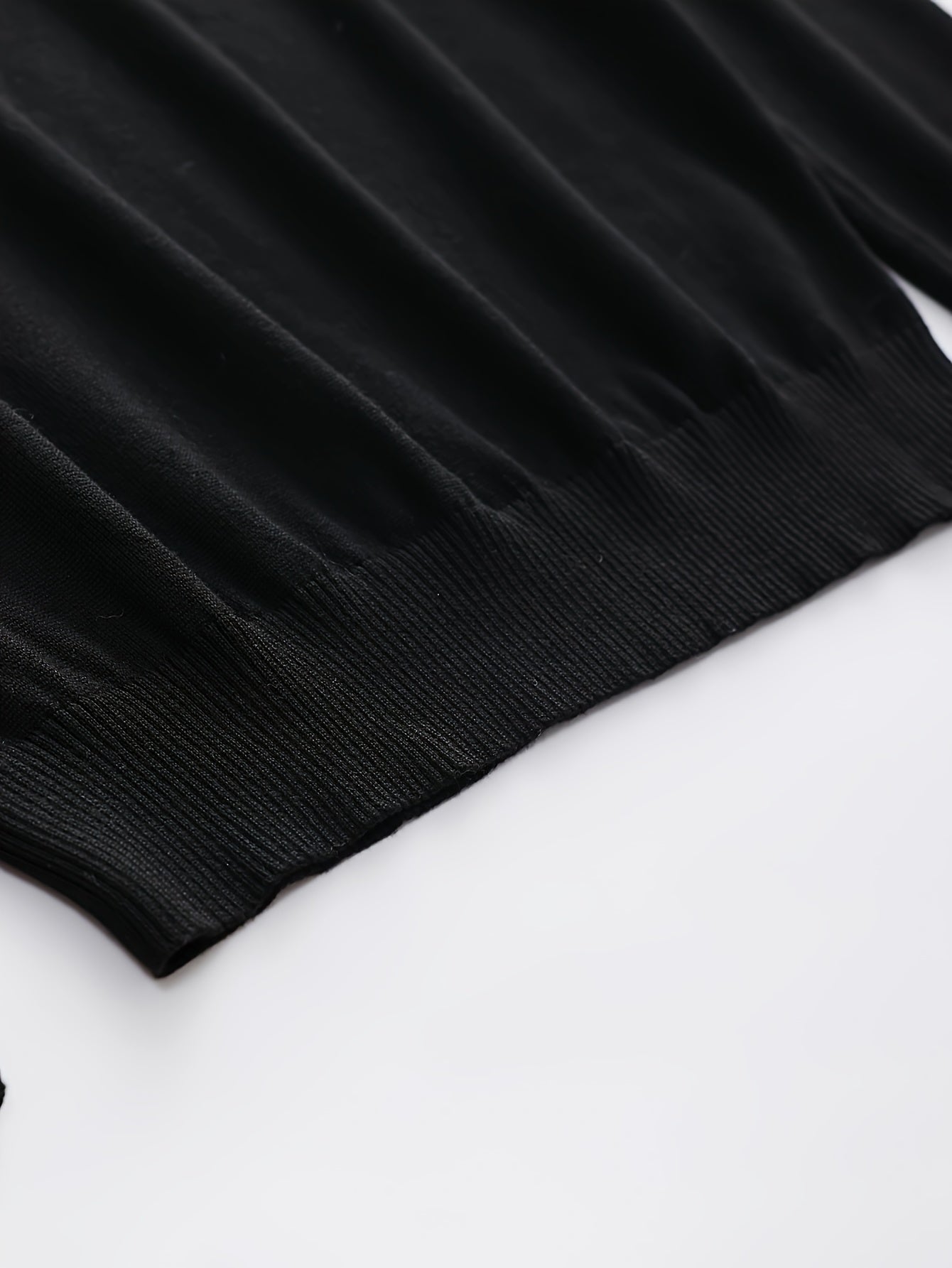 Maglione lavorato ai ferri con motivo a righe