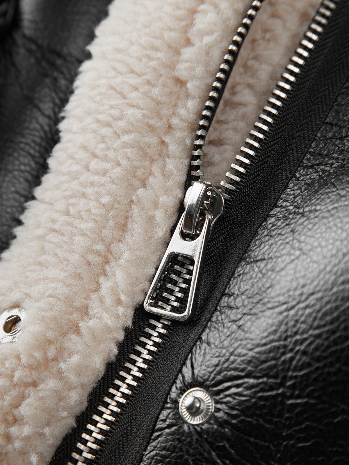 Giacca in pelle con pelliccia per donna