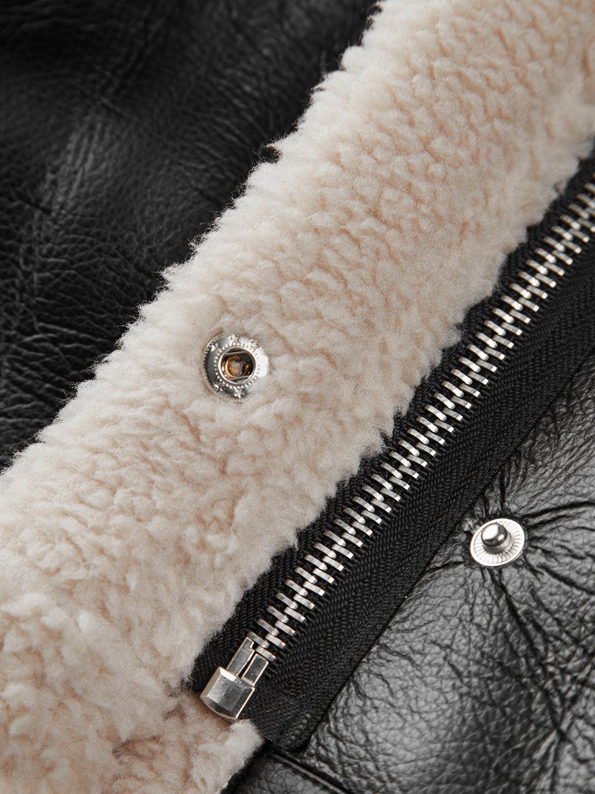 Giacca in pelle con pelliccia per donna