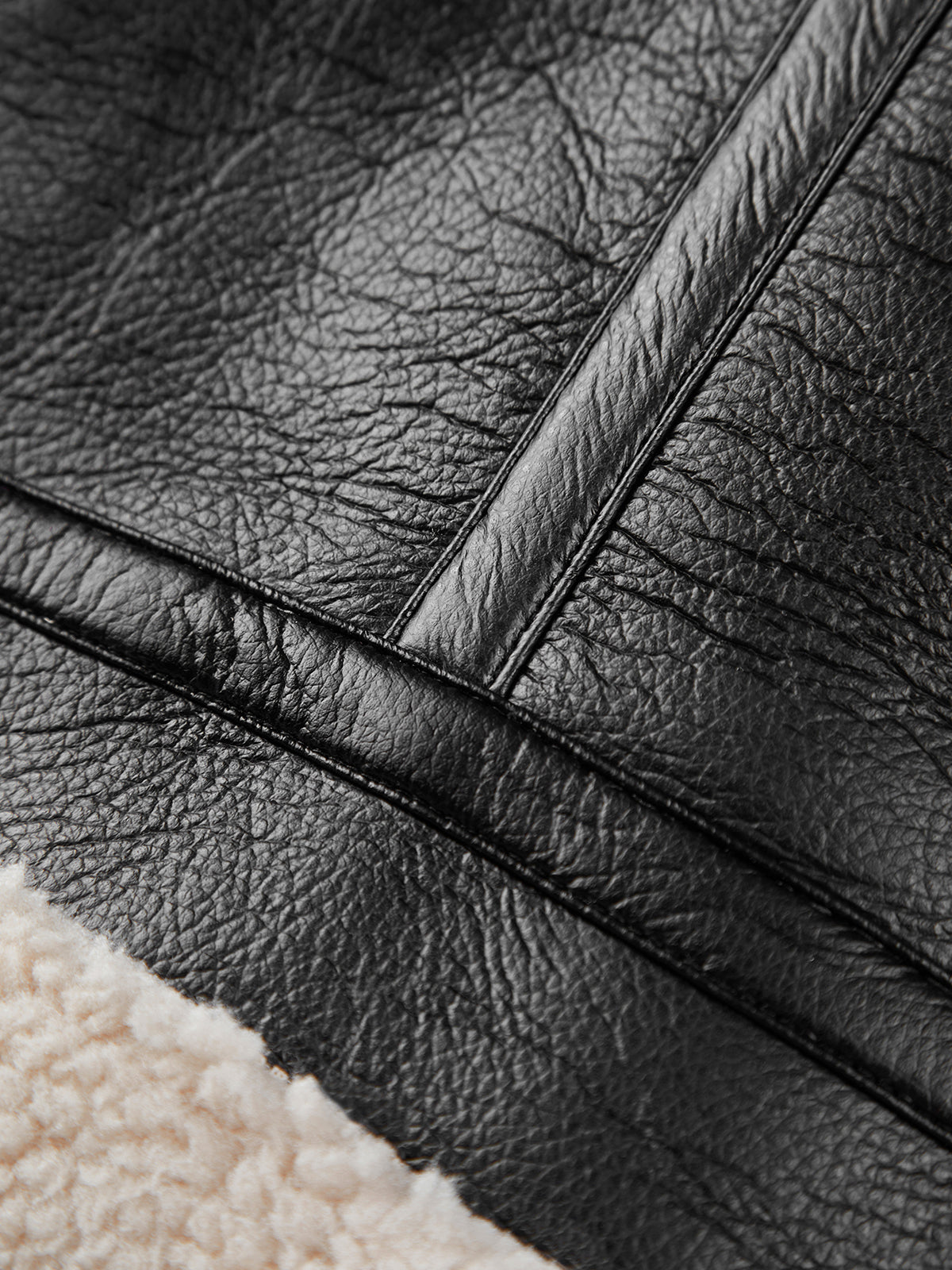 Giacca in pelle con pelliccia per donna