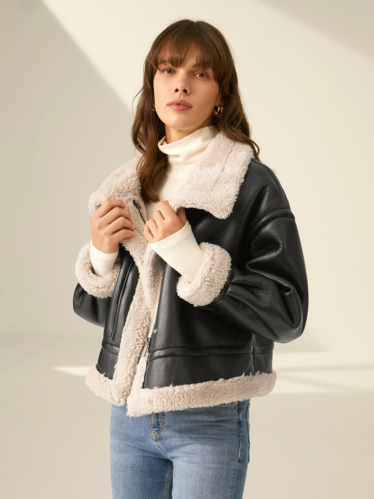 Giacca in pelle con pelliccia per donna
