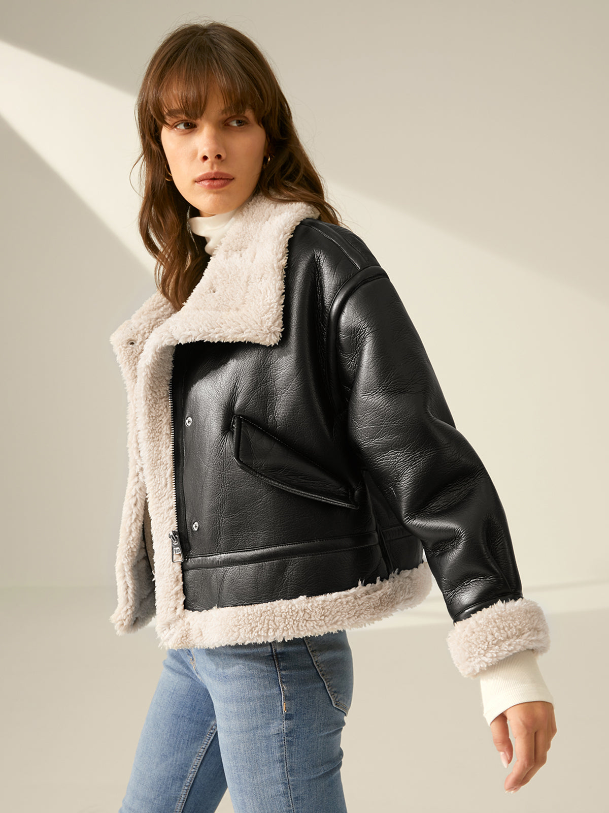 Giacca in pelle con pelliccia per donna