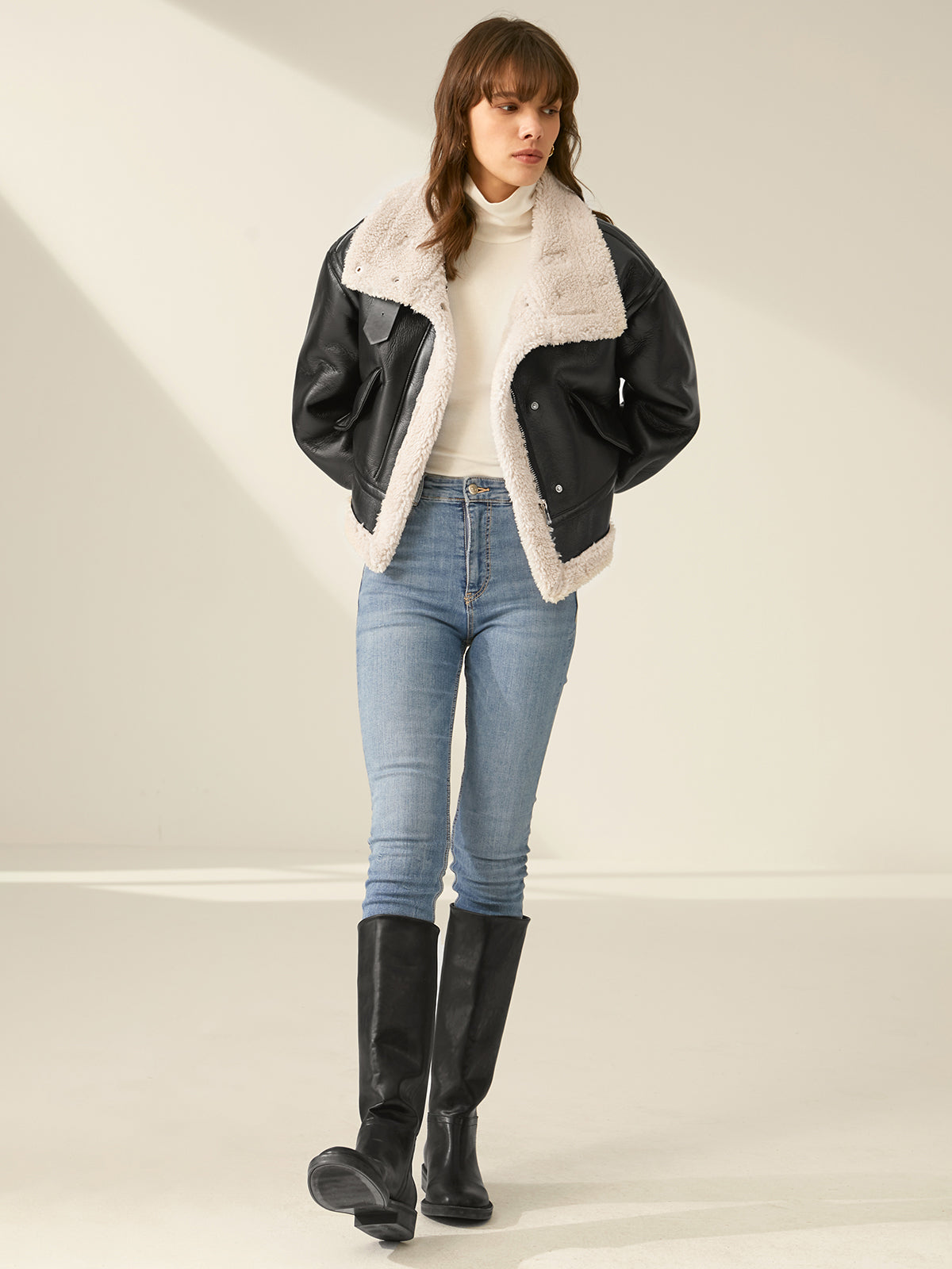Giacca in pelle con pelliccia per donna