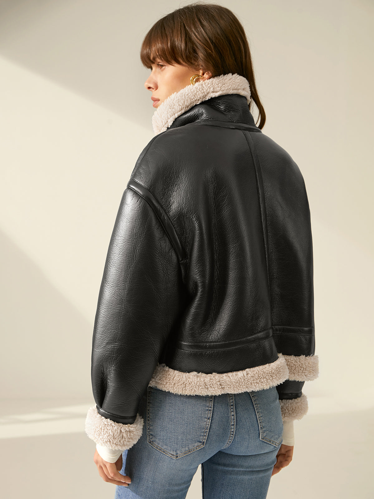 Giacca in pelle con pelliccia per donna