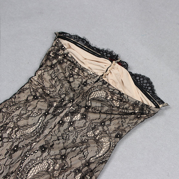Tuta trasparente con scollo in pizzo