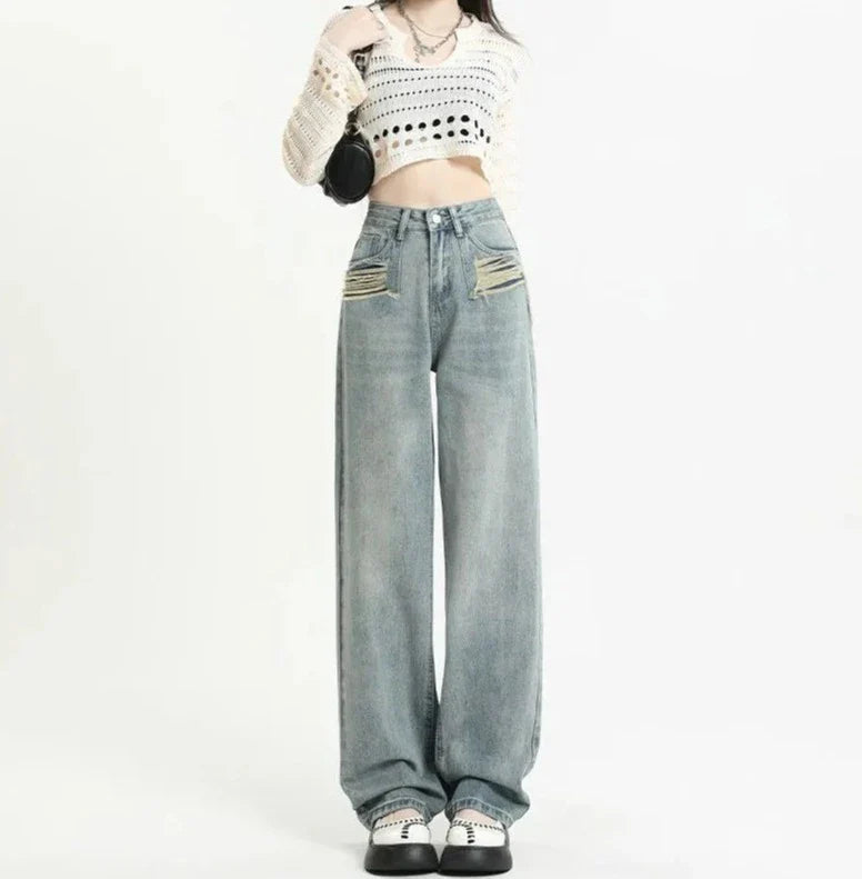 Jeans a vita alta con tasche strappate