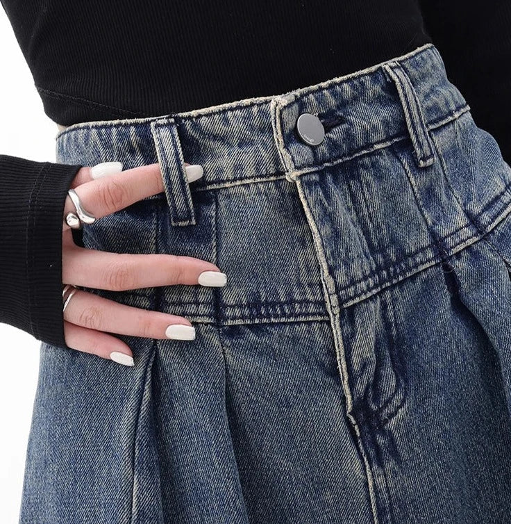 Jeans a vita alta con gamba ampia