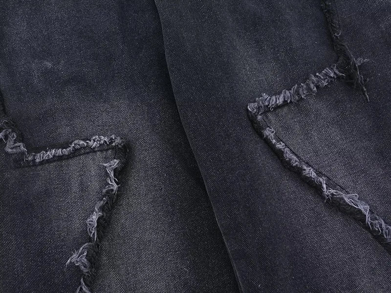 Jeans oversize strappati