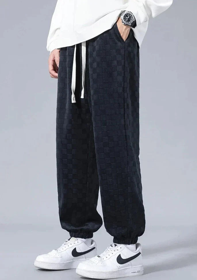 Pantaloni sportivi ampi con fantasia a scacchiera