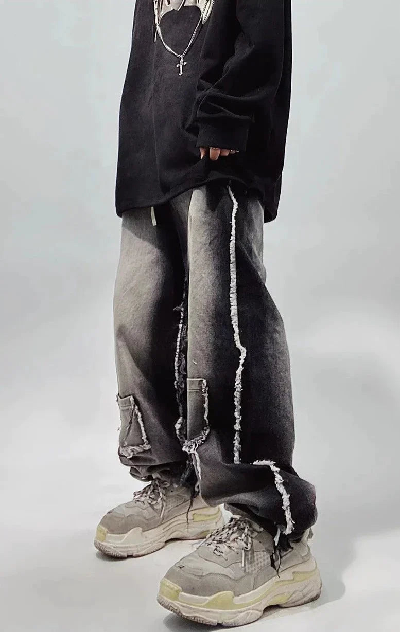 Jeans neri oversize strappati