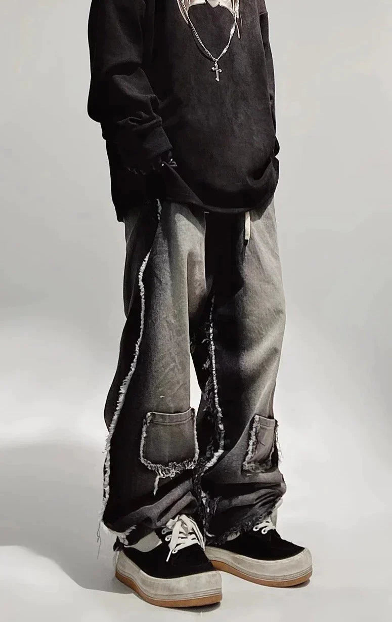Jeans neri oversize strappati