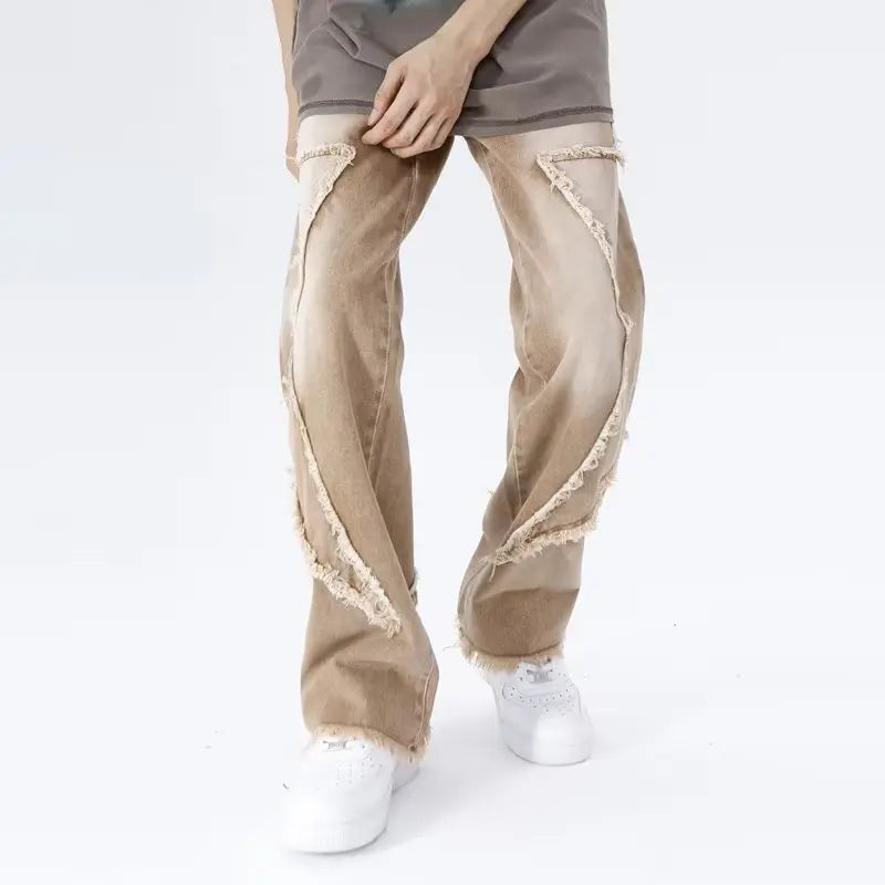 Jeans oversize strappati