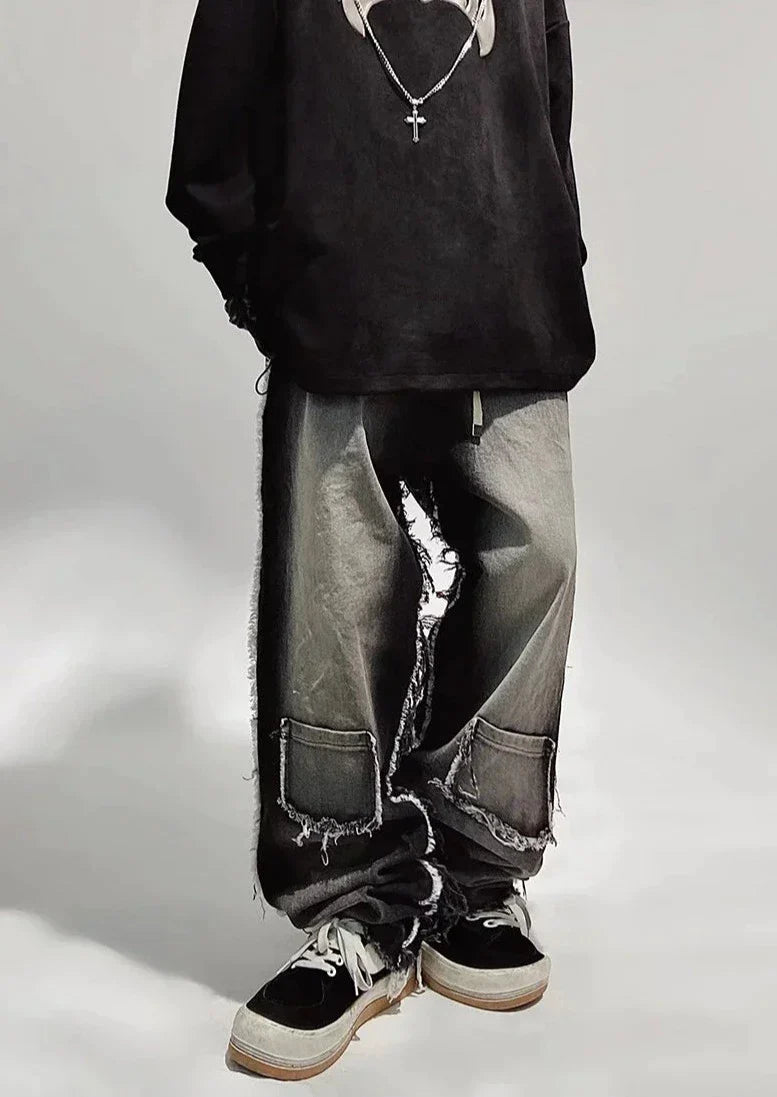 Jeans neri oversize strappati