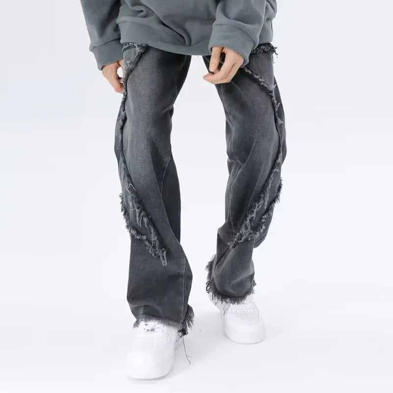 Jeans oversize strappati