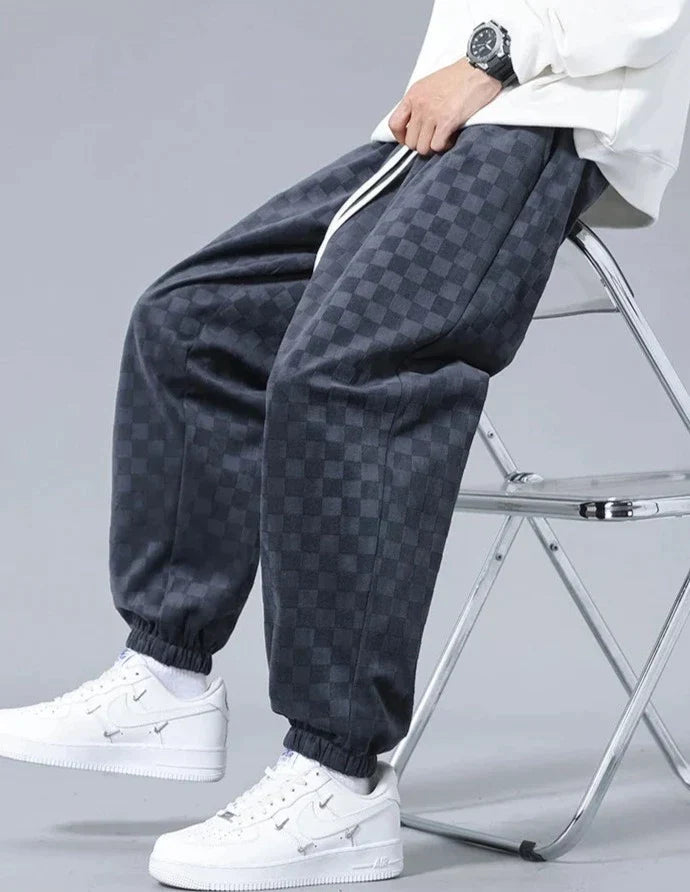 Pantaloni sportivi ampi con fantasia a scacchiera