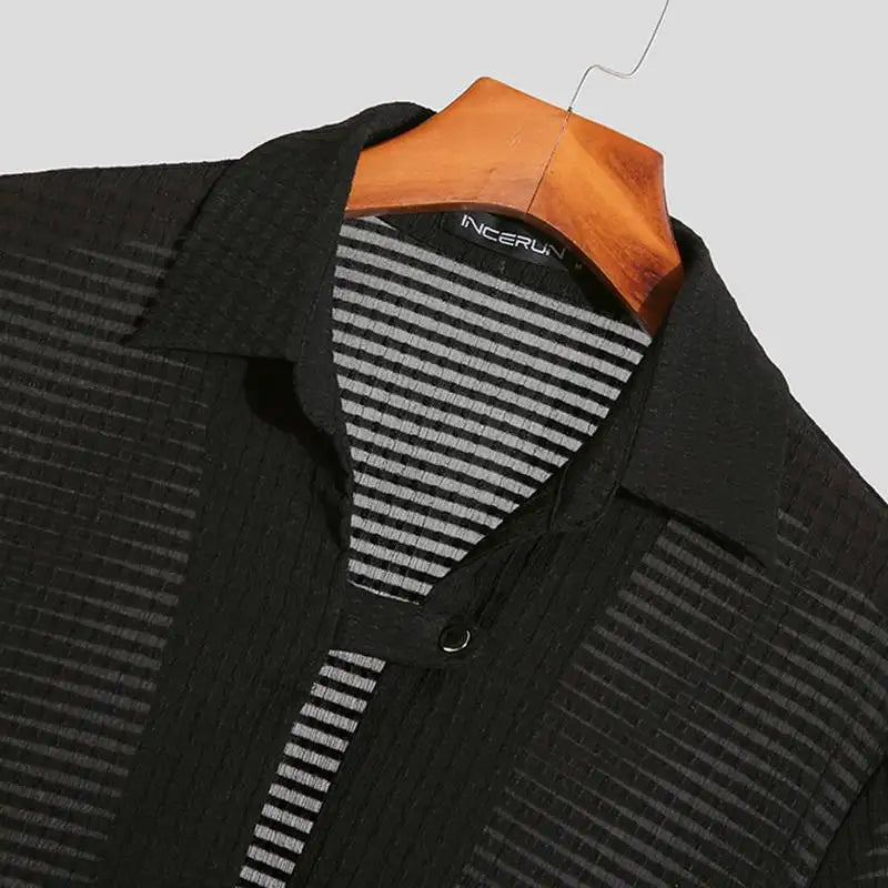 Camicia rigata con maniche lunghe e revers