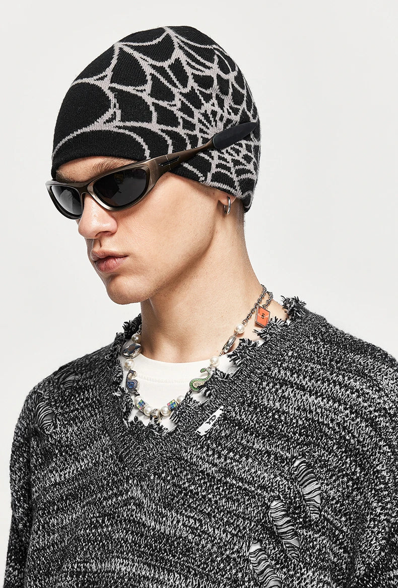 Maglione grigio strappato di High Street