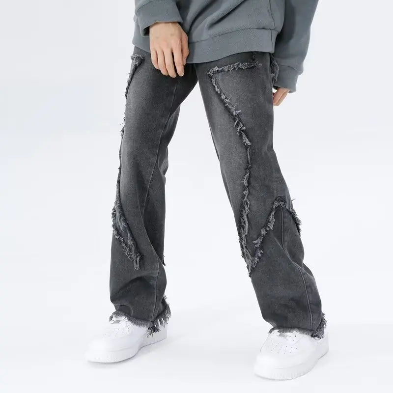 Jeans oversize strappati