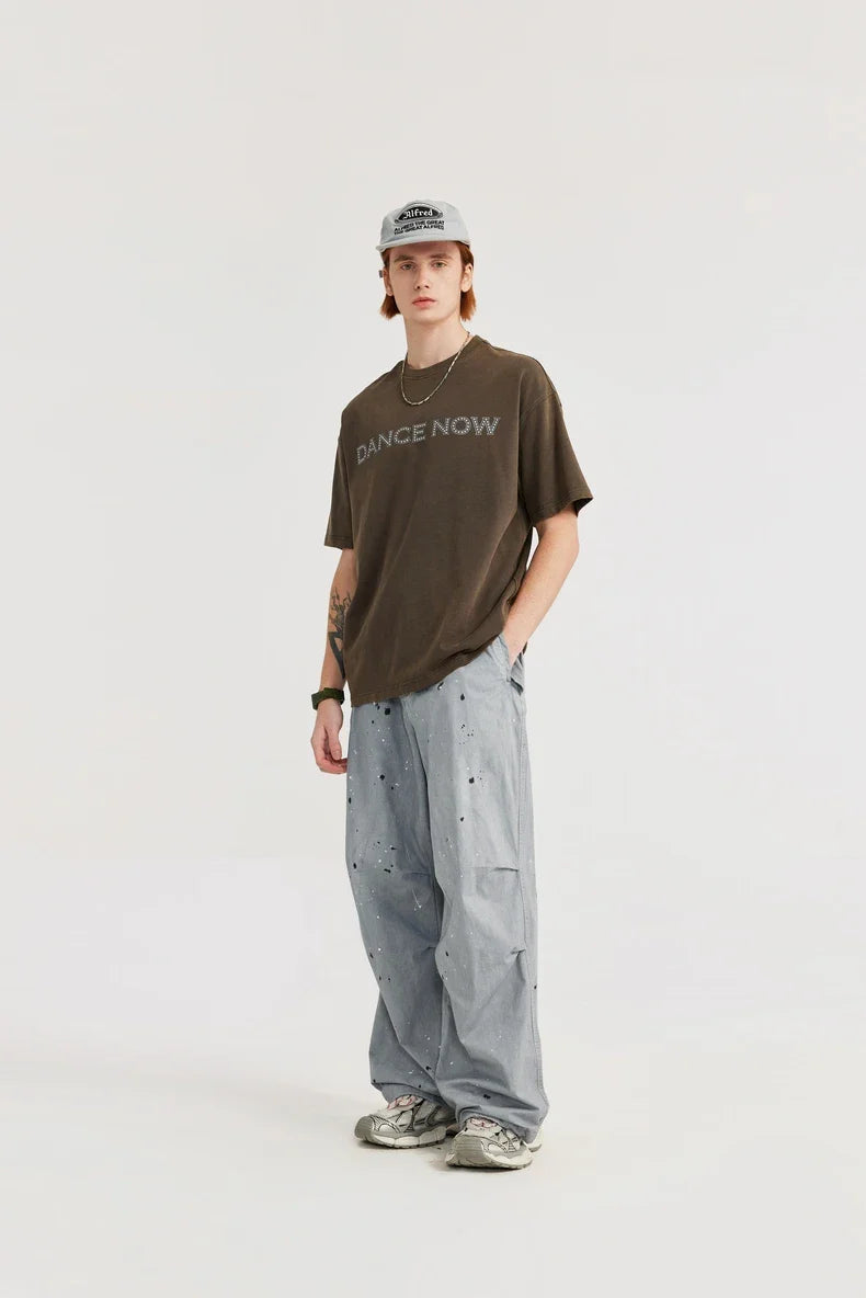 Pantaloni da paracadute lavati e schizzati