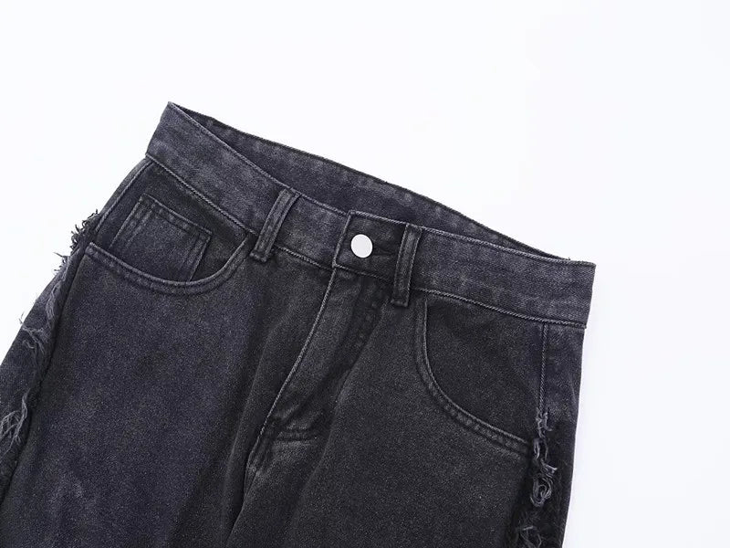 Jeans oversize strappati