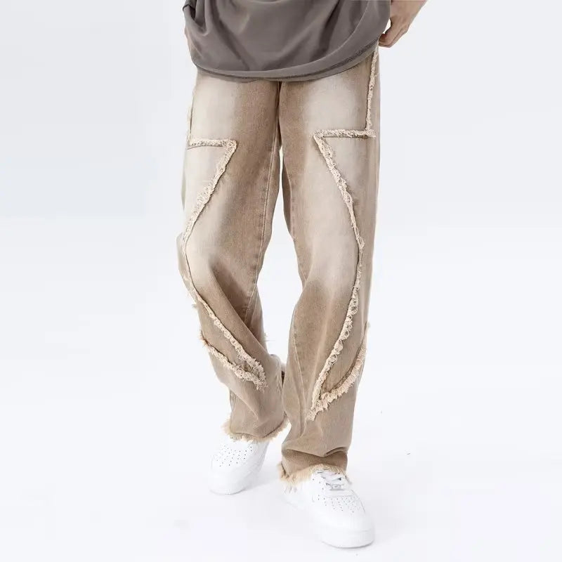 Jeans oversize strappati