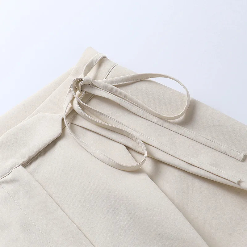 Pantaloni a gamba larga con nastro
