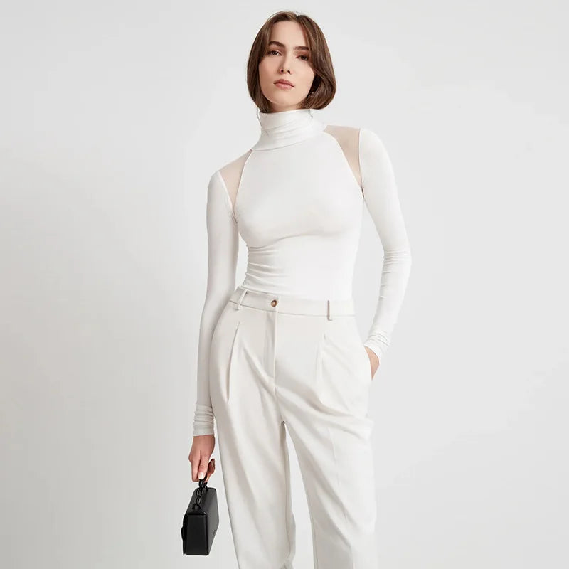 Top elegante con maniche lunghe