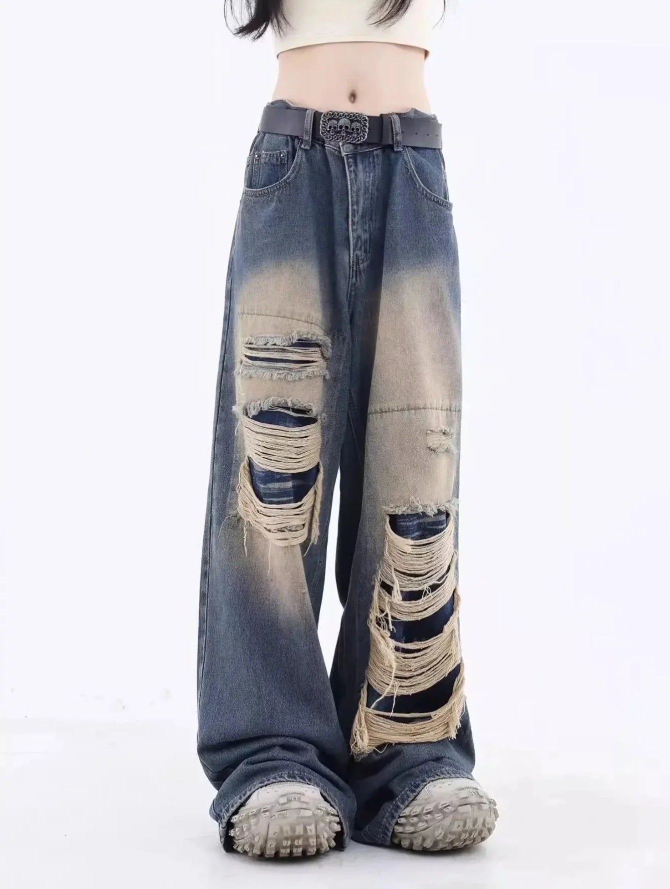 Jeans larghi strappati