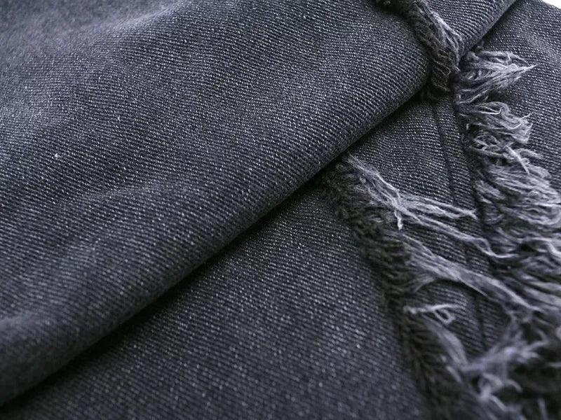 Jeans oversize strappati