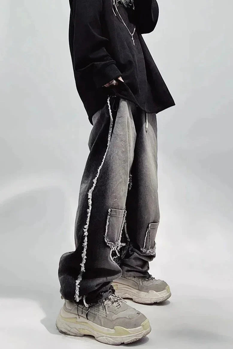 Jeans neri oversize strappati