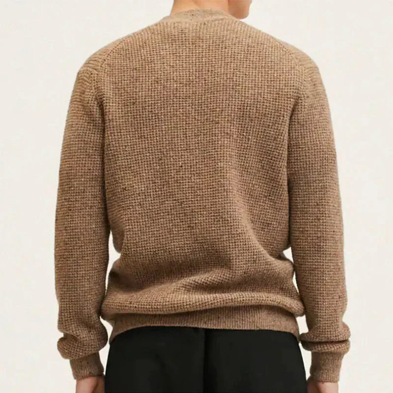 Cardigan beige realizzato in lana strutturata