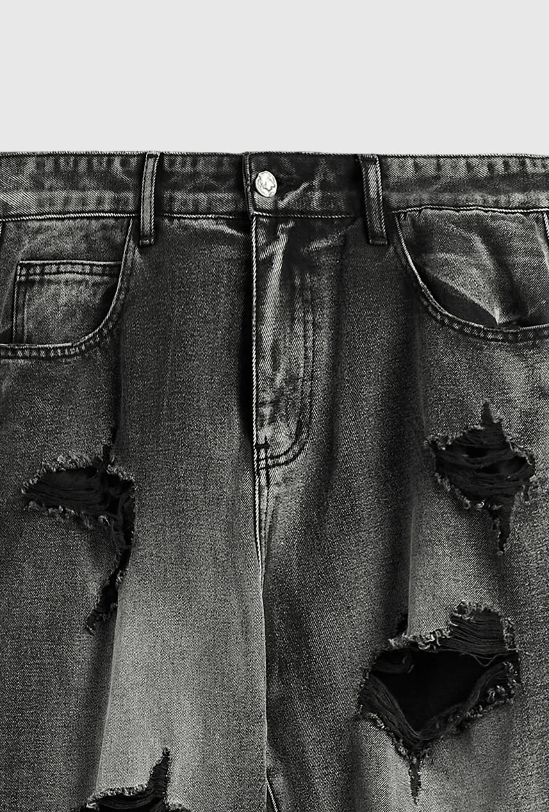 Jeans neri strappati