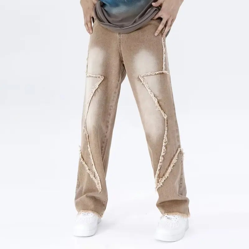 Jeans oversize strappati