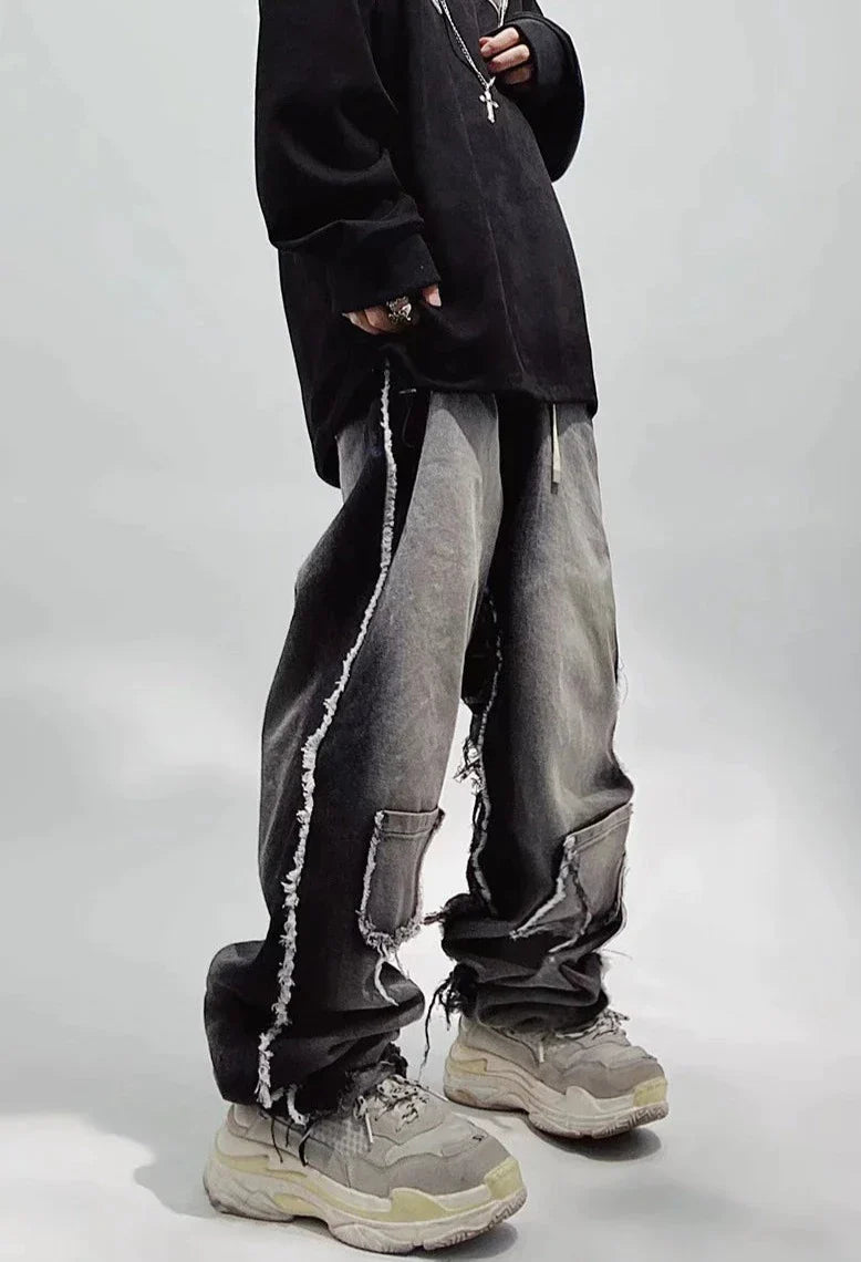 Jeans neri oversize strappati