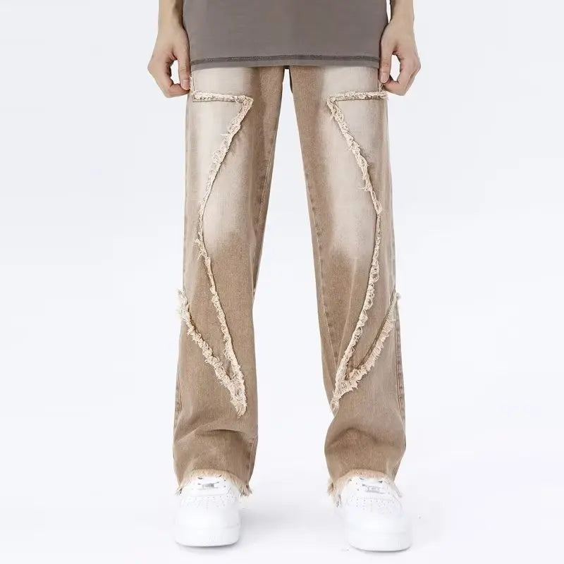 Jeans oversize strappati