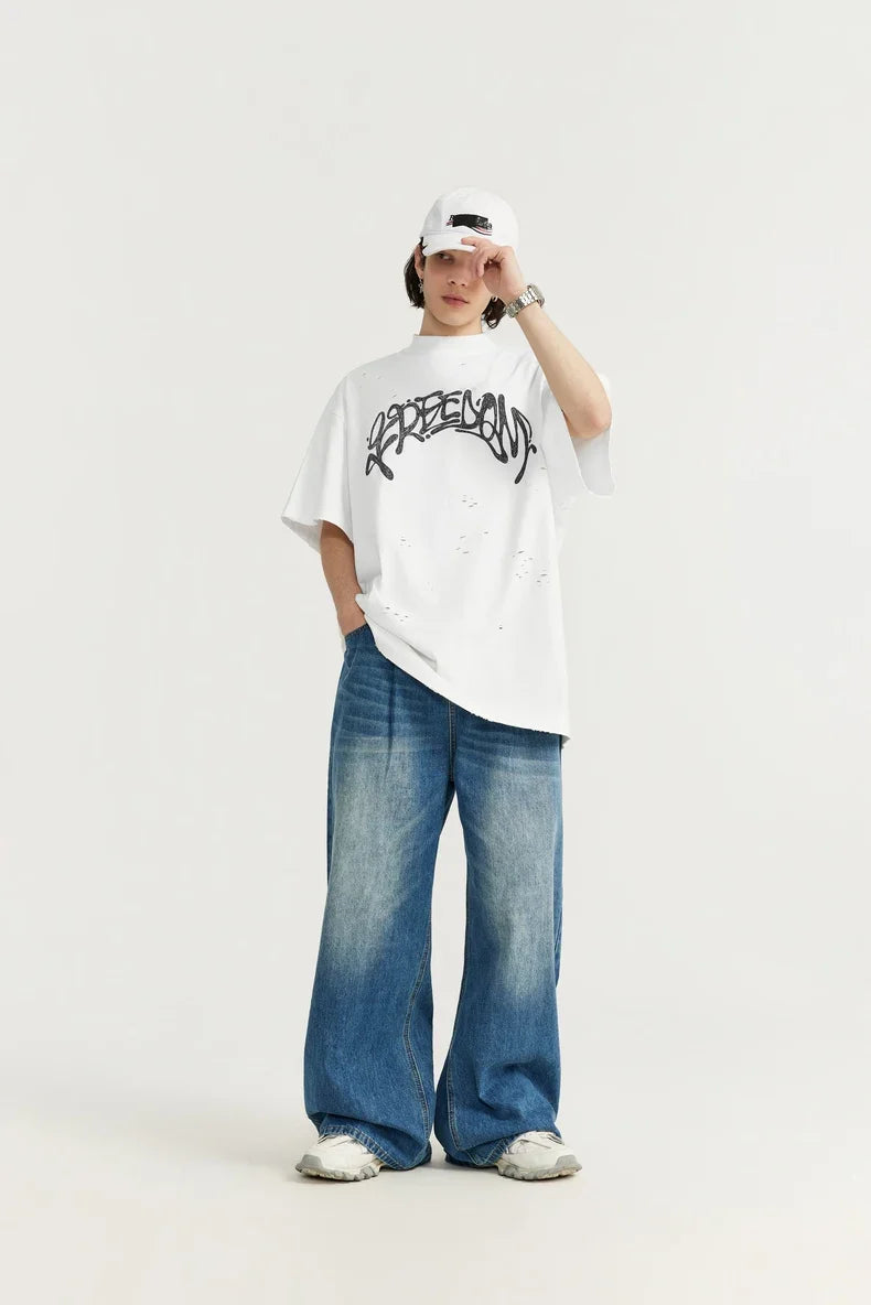 T-shirt strappata con stampa