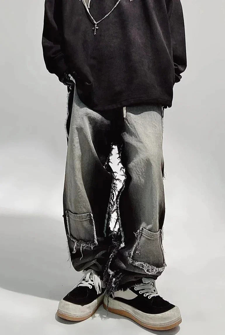 Jeans neri oversize strappati