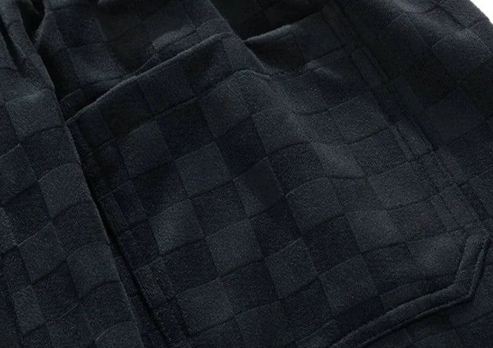 Pantaloni sportivi ampi con fantasia a scacchiera