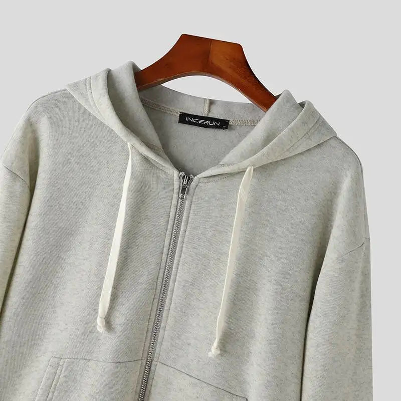 Felpa a maniche lunghe e pantaloncini con cappuccio