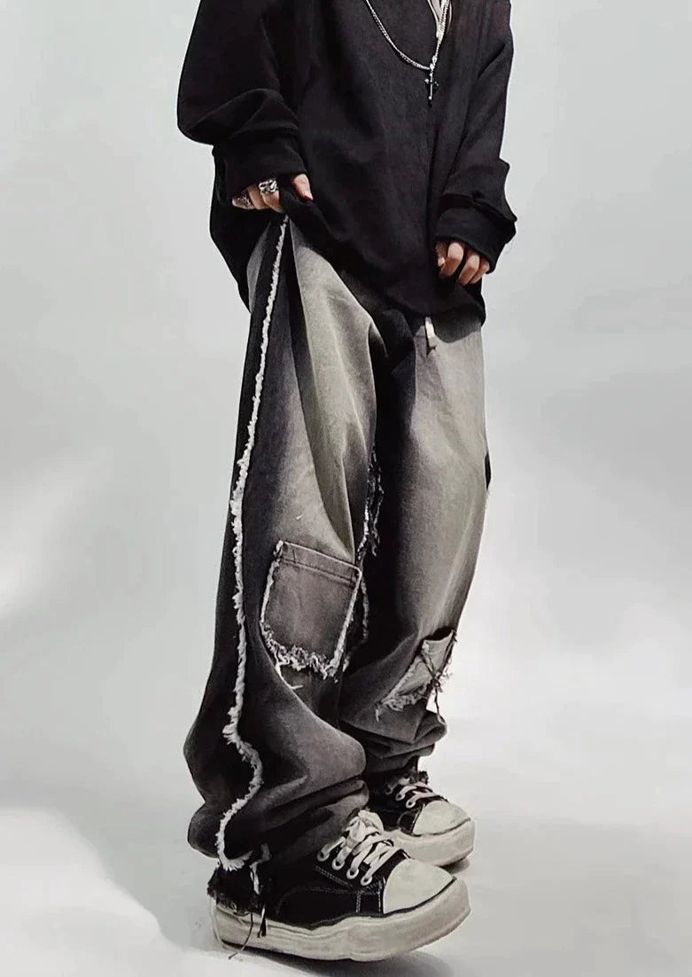 Jeans neri oversize strappati