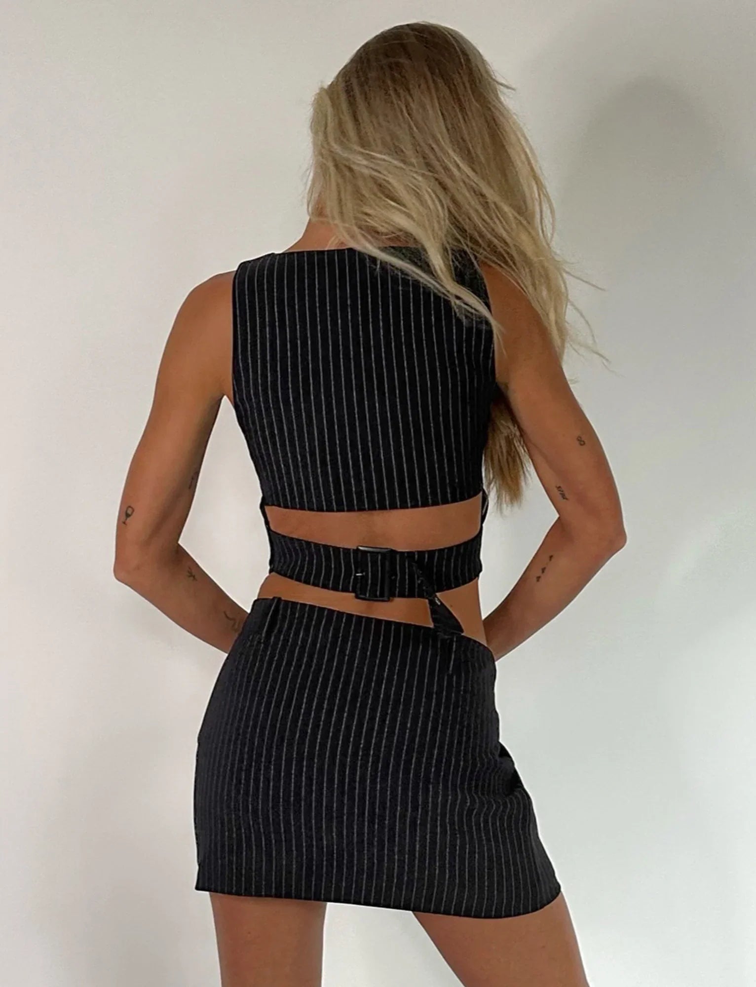 Gilet corto sexy a righe con gonna