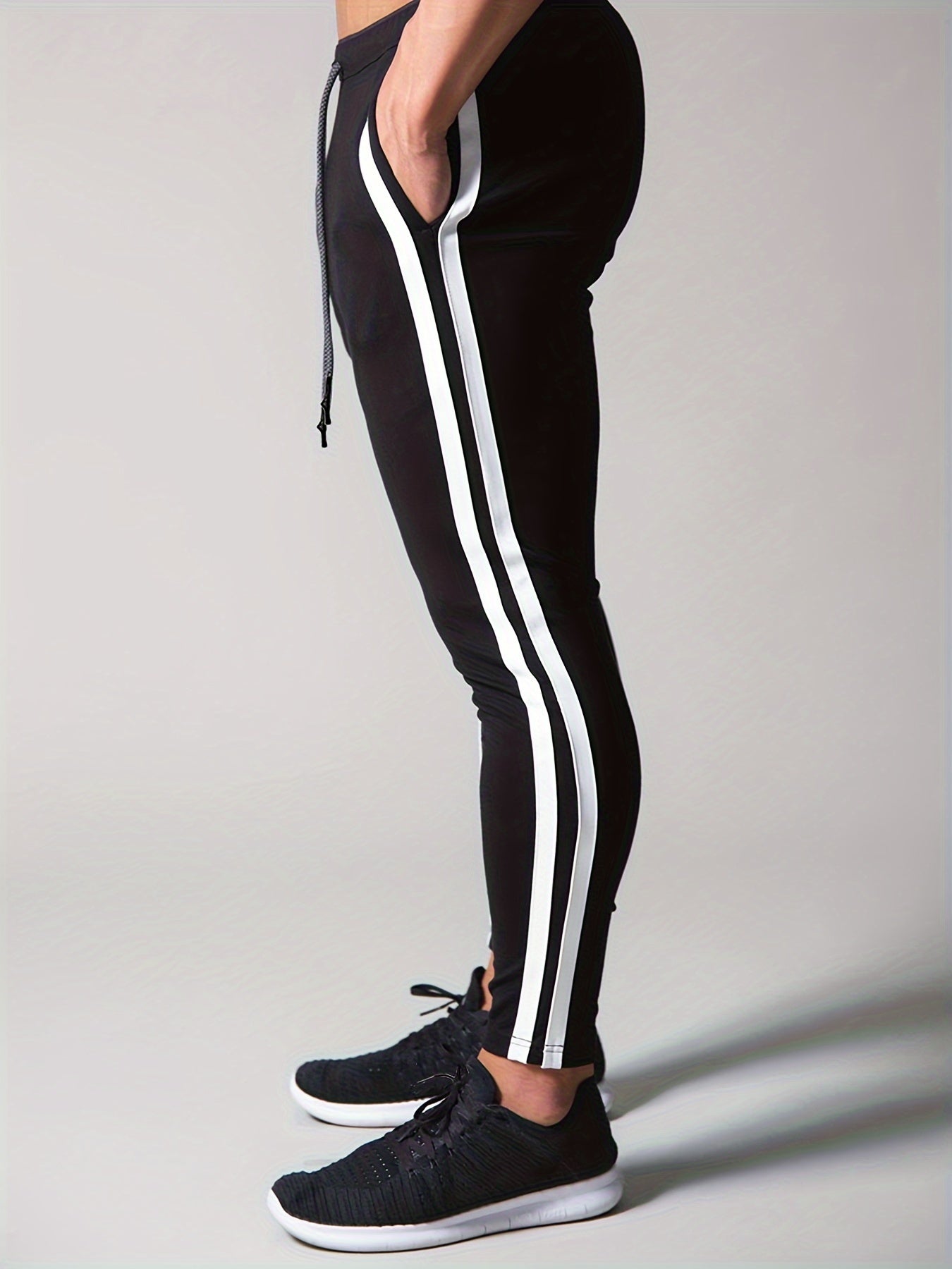 Pantaloni sportivi della tuta con motivo a righe